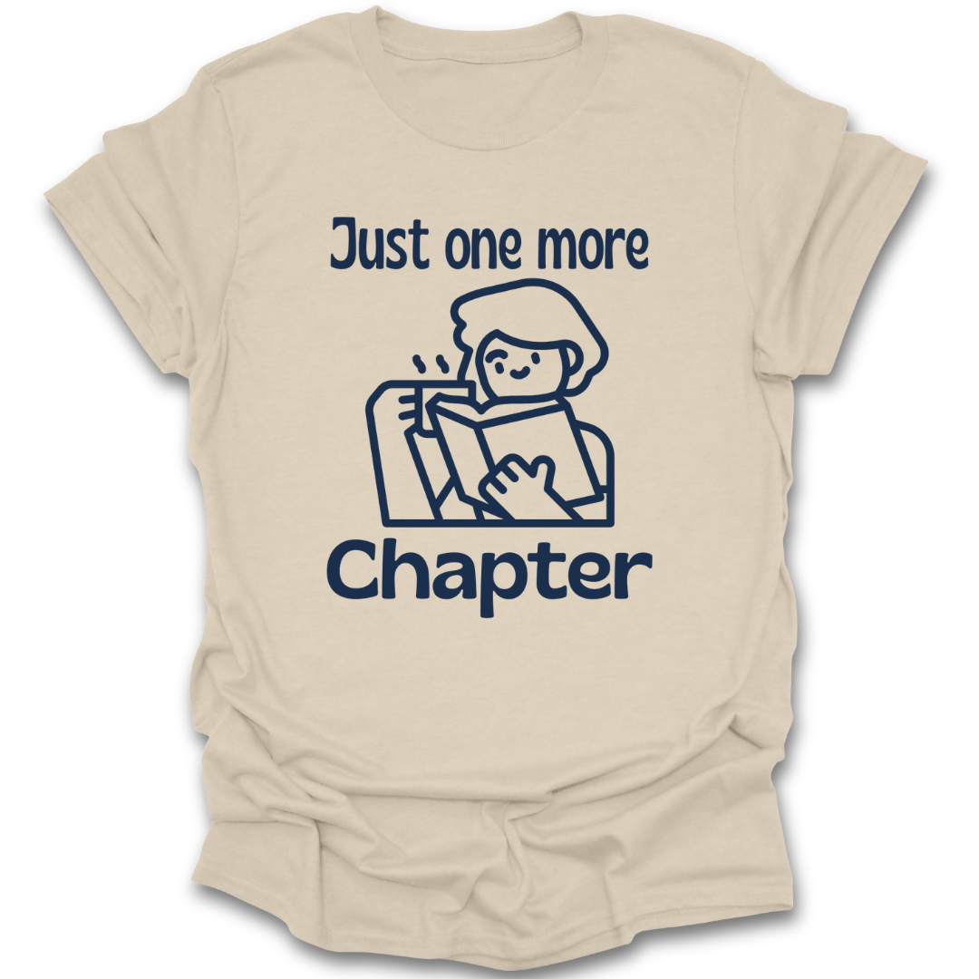 Beige t-shirt with a graphic and text 'Just one more Chapter' on a white background funny book reading literary t shirt