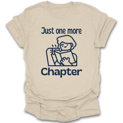 Beige t-shirt with a graphic and text 'Just one more Chapter' on a white background funny book reading literary t shirt