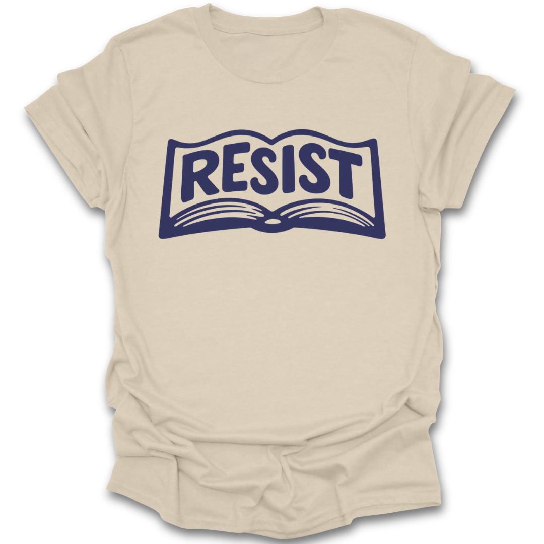 Beige t-shirt with 'RESIST' graphic design on a white background book reading literary t shirt