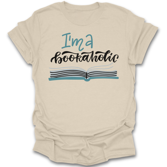 Beige t-shirt with 'I'm a bookaholic' text and book graphic on a white background funny book reading literary t shirt