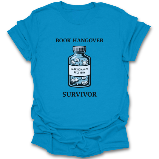Blue t-shirt with a graphic of a bottle labeled 'Dark Romance Recovery' and text 'BOOK HANGOVER SURVIVOR' on a white background. funny book reading literary t shirt