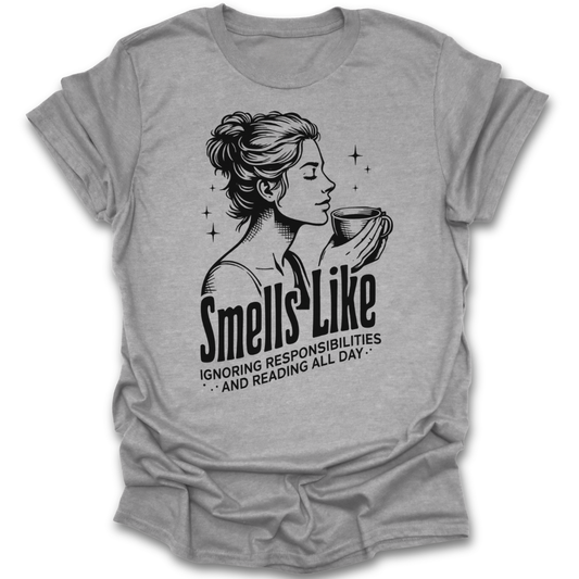 Gray t-shirt with a graphic of a woman holding a cup and text on a white background funny book reading literary t shirt