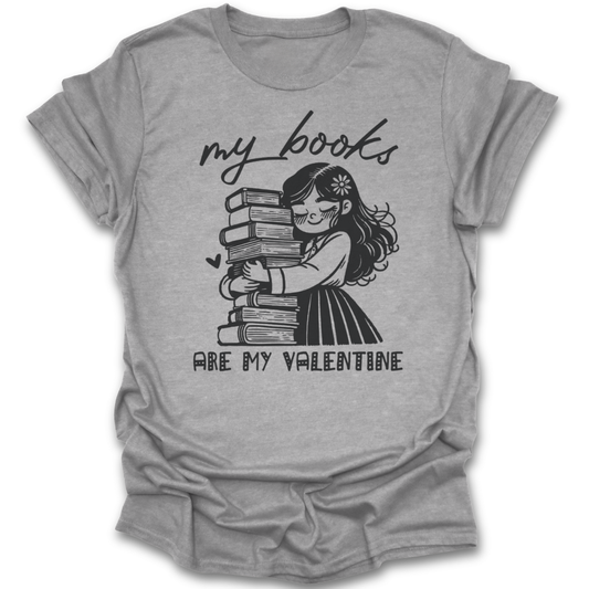 Gray t-shirt with a graphic of a girl hugging books and text 'my books are my valentine' on a white background. romance funny book reading literary t shirt