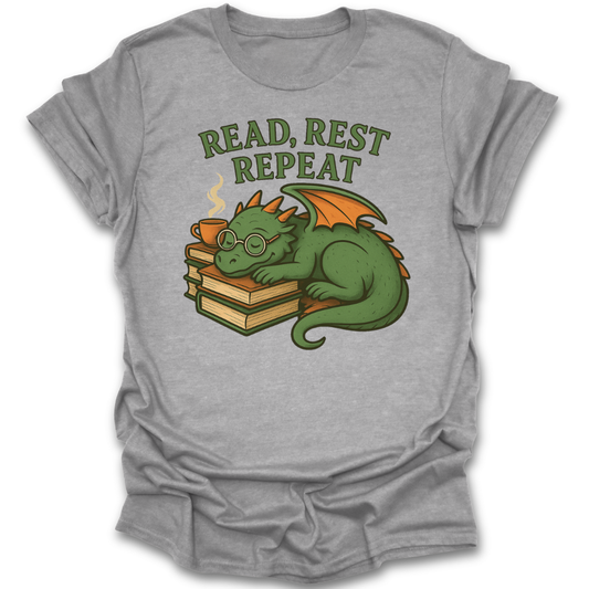 Gray t-shirt with a dragon graphic and 'Read, Rest Repeat' text on a white background fantasy book reading literary t shirt