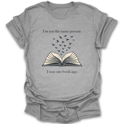 Gray t-shirt with an open book graphic and text on a white background funny book reading literary t shirt