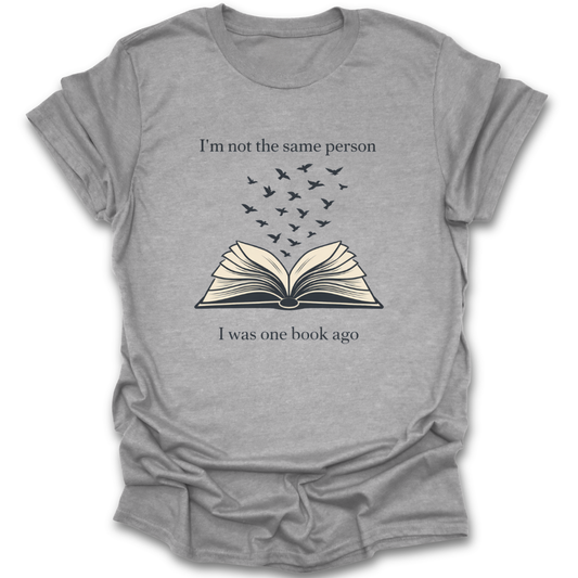 Gray t-shirt with an open book graphic and text on a white background funny book reading literary t shirt