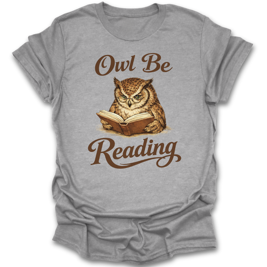 Gray t-shirt with an owl reading a book graphic and 'Owl Be Reading' text on a white background funny book reading literary t shirt