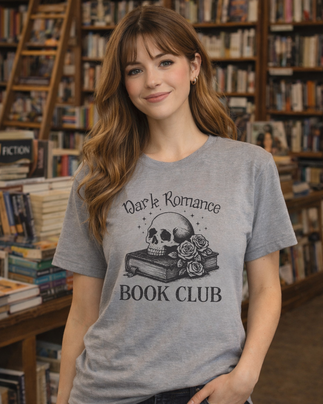 Woman wearing a 'Dark Romance Book Club' t-shirt in a bookstore