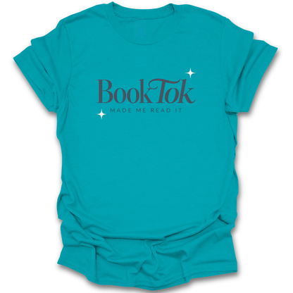 Turquoise t-shirt with 'BookTok Made Me Read It' text on a white background funny book reading literary t shirt
