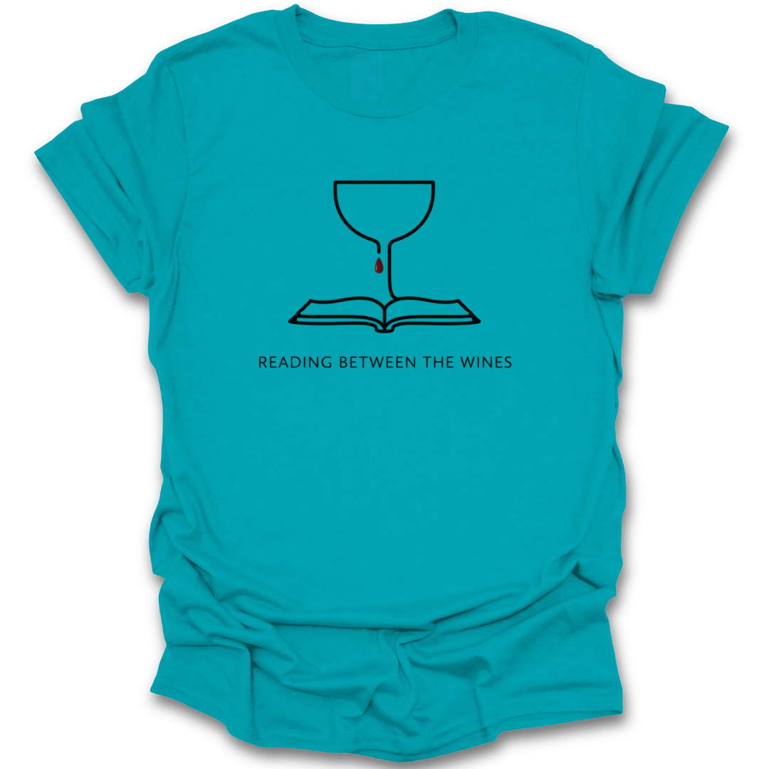 Turquoise t-shirt with a graphic design and text 'Reading Between The Wines' on a white background book lover shirt, reading shirt, wine lover shirt, funny book shirt, book club shirt, bibliophile gift, reader gift, bookworm shirt, literary shirt, wine and books shirt, funny reader tee, bookish apparel, bookstore shirt, librarian gift.
